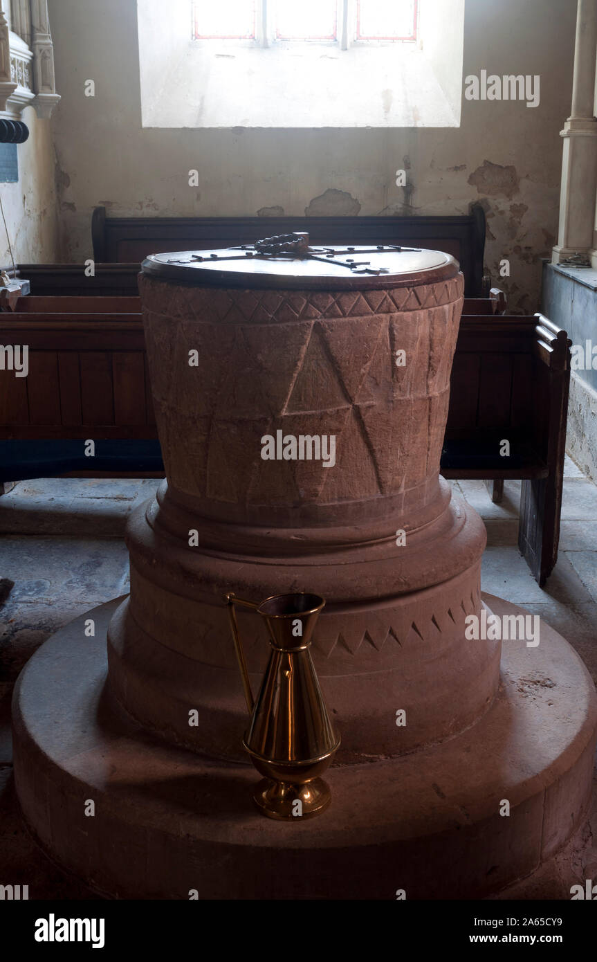 The Norman font, St. Mary`s Church, Glympton, Oxfordshire, England, UK Stock Photo